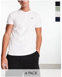 Hollister - Confezione da 4 t-shirt serafino bianco/verde/blu navy/nera con logo - Lyst