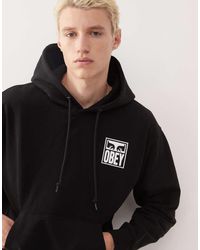 Obey - Sudadera Negra Con Capucha Y Estampado Gráfico En La Espalda De Logo Y Ojos Icon De - Lyst