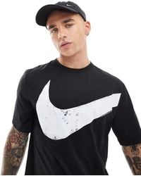 Nike - T-shirt dri-fit à motif virgule - Lyst