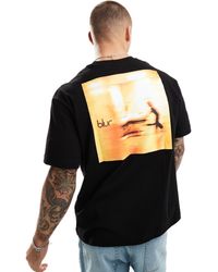 Bershka - T-shirt nera con stampa blur sulla schiena - Lyst