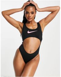 Nike – badeanzug mit cut-out und streifen mit tierfellmuster - Schwarz