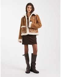 Hollister - Embroidered Cropped Shearling Jacket - Lyst