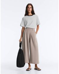 Oysho - Soft-touch Wide-leg Crop Trousers With Modal And Pleats - Lyst