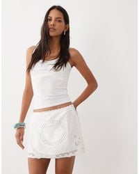 Mango - 100% Cotton Embroidered Wrap Mini Skirt - Lyst