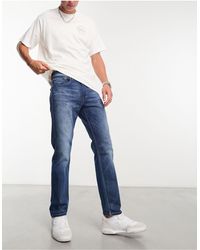 Levi's - 502 Tapered Fit Jeans - Lyst
