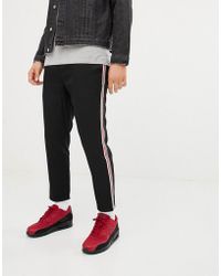Pantalones, pantalones de vestir y chinos Pull\u0026Bear de hombre desde 18 €
