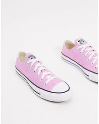 converse chuck taylor ox trainers in triple white