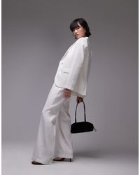 Mango - Pantaloni Sartoriali Bianchi Con Vita Elasticizzata E Zip Laterale - Lyst