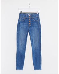 Alice + Olivia Skinny Jeans Met Hoge Taille En Knopen - Blauw