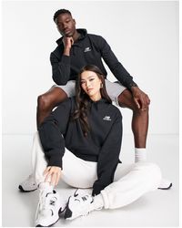 New Balance - Sudadera negra unisex con capucha y logo - Lyst