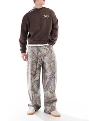 Hollister - Jean ultra baggy style charpentier à motif camouflage - Lyst