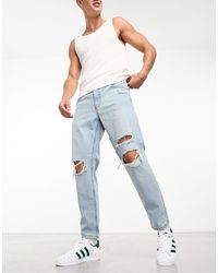 ASOS - Jeans rigidi modello classico lavaggio chiaro con strappi sulle ginocchia - Lyst