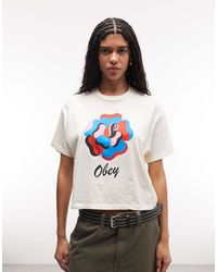 Obey - T-Shirt Met Korte Mouwen En Grafische Roosprint - Lyst