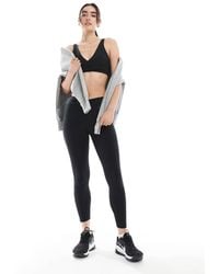 Nike - Leggings De 7/8 Negros Cruzados De Nike One Training - Lyst
