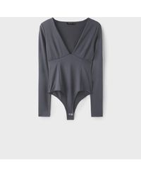 Stradivarius - V-neck Bodysuit With Under-bust Gathering - Lyst
