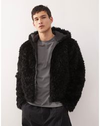 Weekday - Veste en fausse fourrure à capuche - Lyst