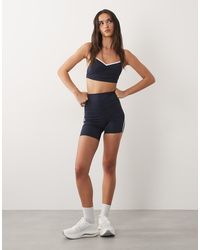 4505 - Active Side Stripe High Waist 5" legging Shorts - Lyst