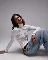 TOPSHOP - Premium Rib Long Sleeve Funnel Neck Top - Lyst