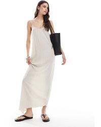 Vero Moda - Plisse Jersey Maxi Dress With Asymmetric Hem - Lyst