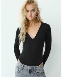 Pull&Bear - V-Neck Bodysuit - Lyst