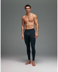 4505 - Leggings Base Layer A Compressione Neri Senza Cuciture Che Definiscono La Figura - Lyst