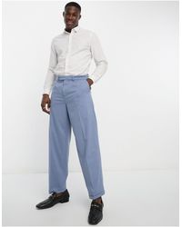 New Look - Pantalones azules holgados con pinzas delanteras - Lyst