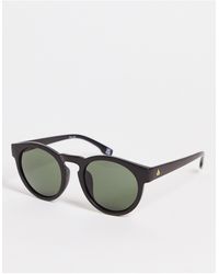 Aire - Cursa - occhiali da sole rotondi neri - Lyst