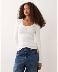 Calvin Klein - Woven Label Long Sleeve Rib Scoop Neck Top - Lyst