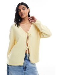 ASOS - Gilet oversize en maille avec col v et liens noués sur l'avant - babeurre - Lyst