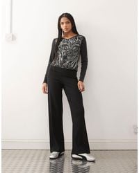 Collusion - Foldover Waist Ribbed Flare Yoga Pants - Lyst