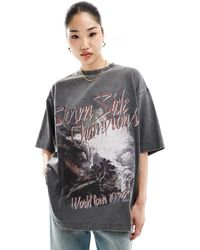 ASOS - T-shirt oversize antracite slavato con grafica rock - Lyst