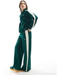 PUMA - T7 Low Rise Track Pants - Lyst