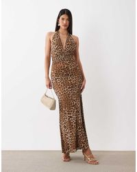 Bardot - Vestido Largo Escotado Con Cuello Halter Y Estampado De Leopardo De Malla Elera-Negro - Lyst