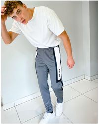 nike heritage popper polyknit joggers in black