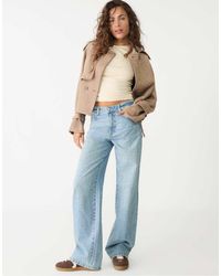 Stradivarius - Jeans Dritti Medio Con Strass - Lyst