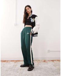 KTZ - Broek Met Wijde Pijpen En Zijstrepen - Lyst