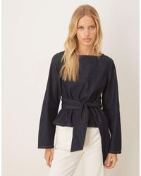 ASOS - Top manches longues en denim avec taille cintrée à détail noué - indigo - Lyst
