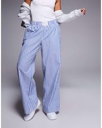 Nike - Pantaloni A Fondo Ampio E Bianchi A Righe - Lyst