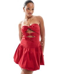 The Frolic - Exclusive Bandeau Bow Detail Cut Out Satin Puffball Mini Dress - Lyst
