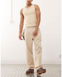 Obey - Jean baggy classique à rayures - beige - Lyst