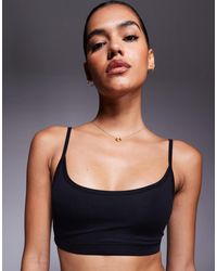 4505 - Icon Soft Touch Light Support Sports Bra With Adjustable Straps - Lyst