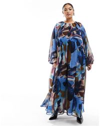 ASOS - Asos design curve - robe babydoll longue en mousseline à imprimé abstrait avec taille festonnée - violet - Lyst