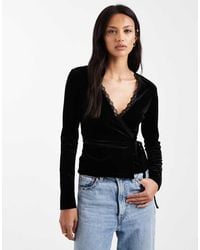 Miss Selfridge - Fluwelen Wikkeltop Met Lange Mouwen - Lyst