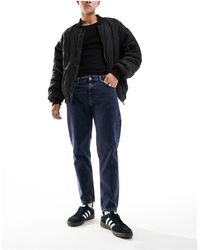 Calvin Klein - Jeans dad fit lavaggio scuro - Lyst
