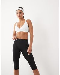4505 - Low Rise Capri Yoga legging - Lyst