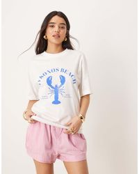Gina Tricot - Oversized T-Shirt Met Korte Mouwen En Mykonos Strandprint - Lyst
