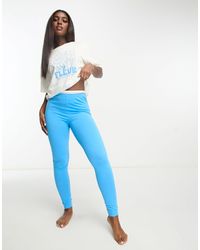 ASOS - Pigiama con t-shirt oversize color crema e leggings blu con stampa floreale - Lyst