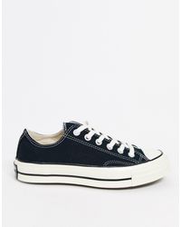 converse chuck 70 ox flocked leopard print sneakers in black