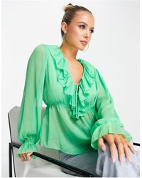 Mango - Blusa verde con volantes - Lyst