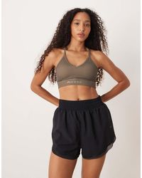 OOSC - Medium Support Infinite Sports Bra - Lyst